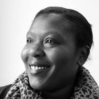 Image of Abigail Ampofo in black and white looking to the left of the camera